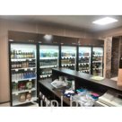 Покраска холодильных шкафов в цвет интерьера магазина.