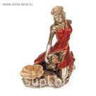 Статуэтка "Девушка сидит у цветка" комбинированно-медный