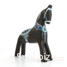 A black horse with a blue and white pattern