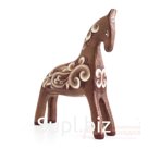 A bay horse with cream curls