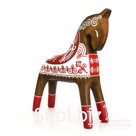 A bay horse in red boots
