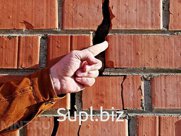 Экспертиза по определению причин возникновения усадки фундаментов, определение причин возникновения трещин и разрушений строений