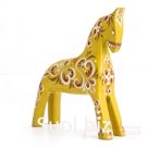 Palomino horse with a wood carving design